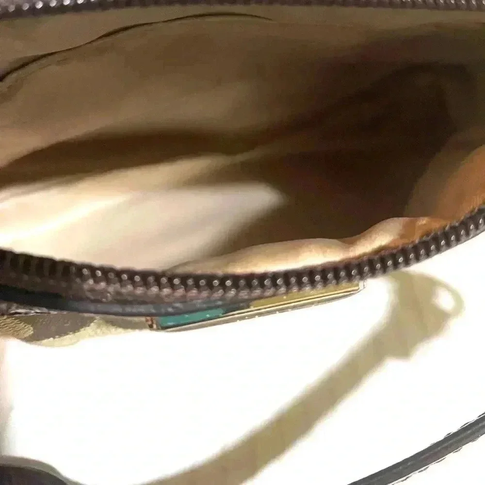 Coach CC signature print canvas wristlet